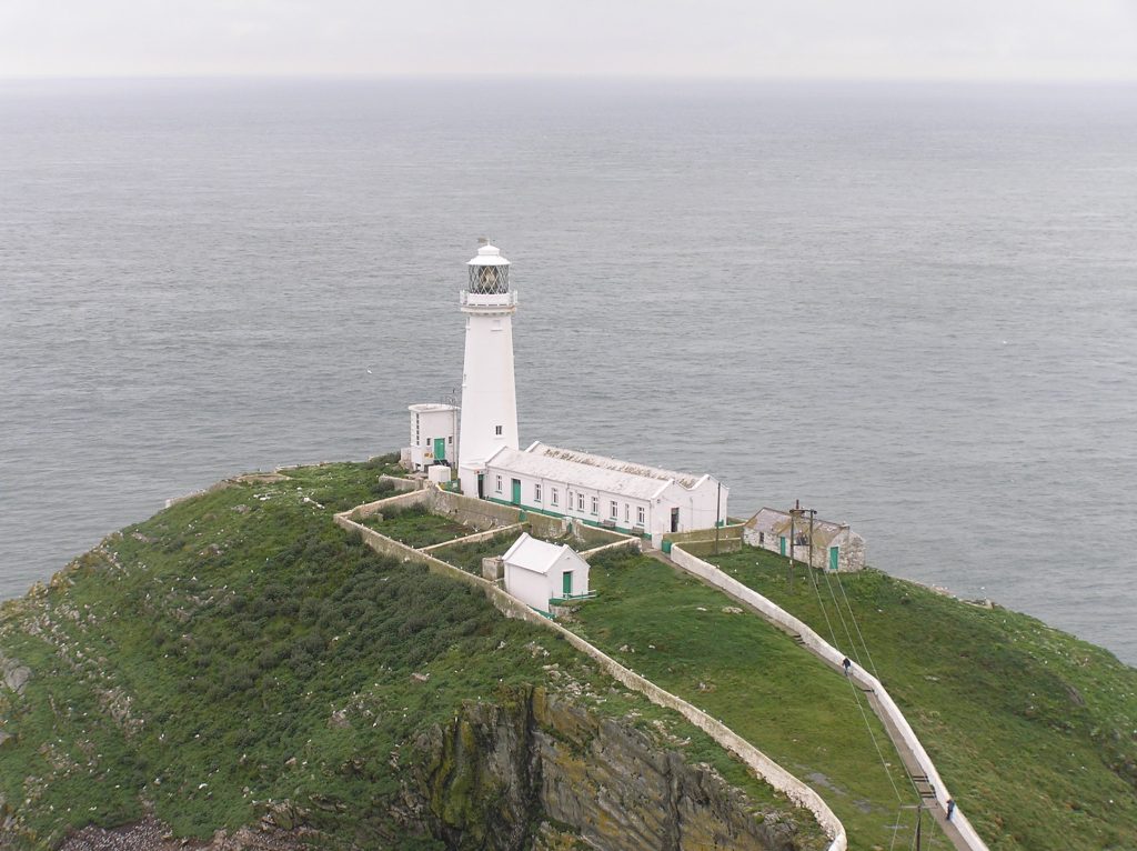 lighthouse and buildings on the island of south stack