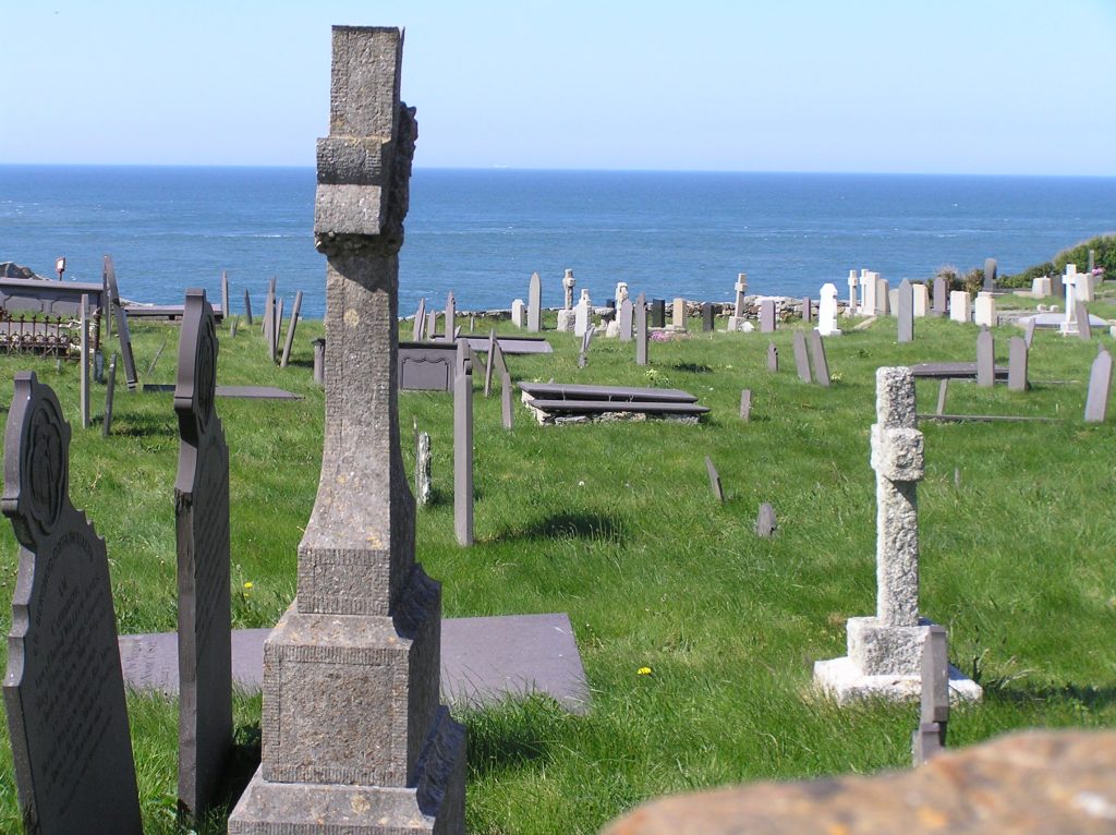 cliff top graveyard with tilting head stones at Llanbadrig church